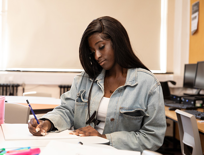 student working on their course