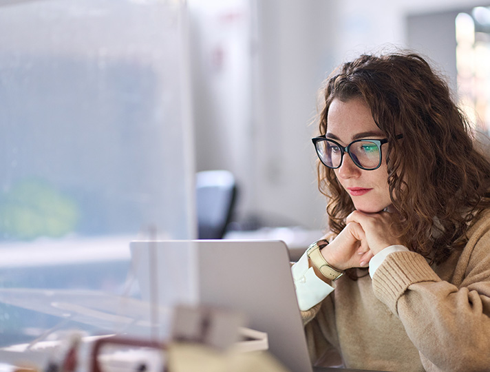 Adult working from home on a computer