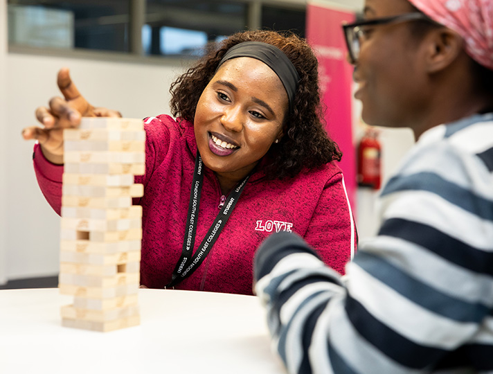 Students playing jenga